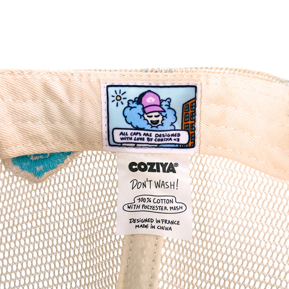Label intérieur casquette trucker Coziya® - détail qualité couture BD